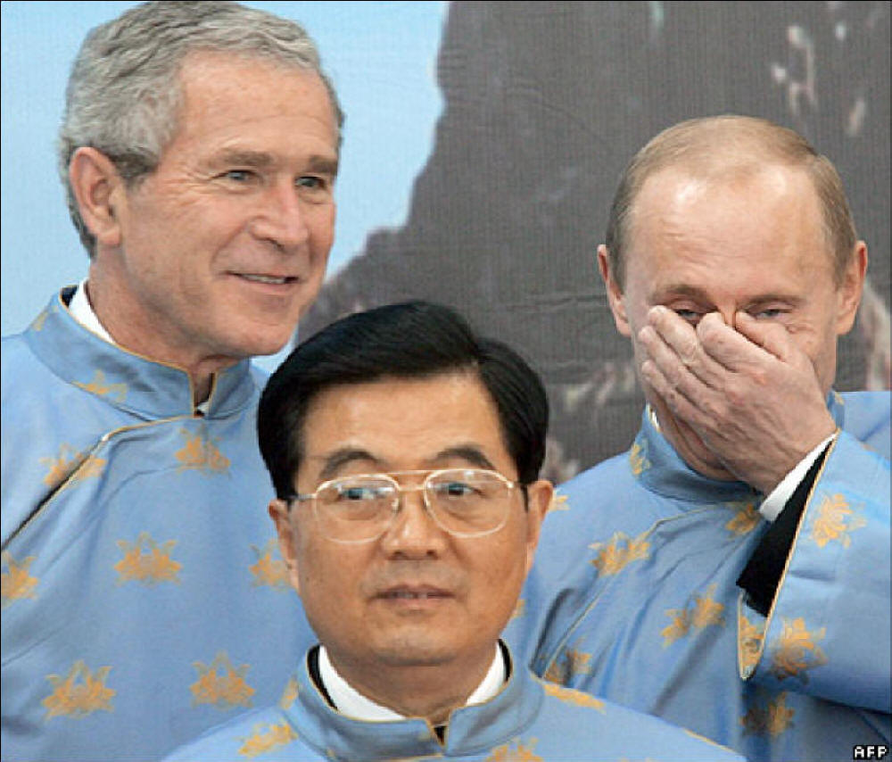 Bush, Putin, and Jintao in cerimonial tunics
